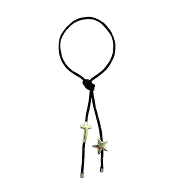 Black paracord wrap necklace designed to tie around the neck, featuring magnetic star and cross charms in 18K gold plating by Julie Saldivia