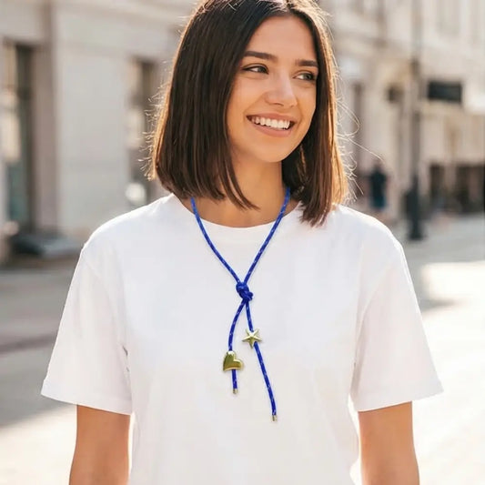 Trendy blue paracord necklace with gold charms heart and star casual chic jewelry style