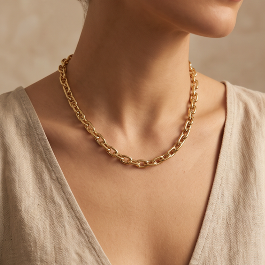 Woman wearing Élan Link 18K gold plated oval chain necklace