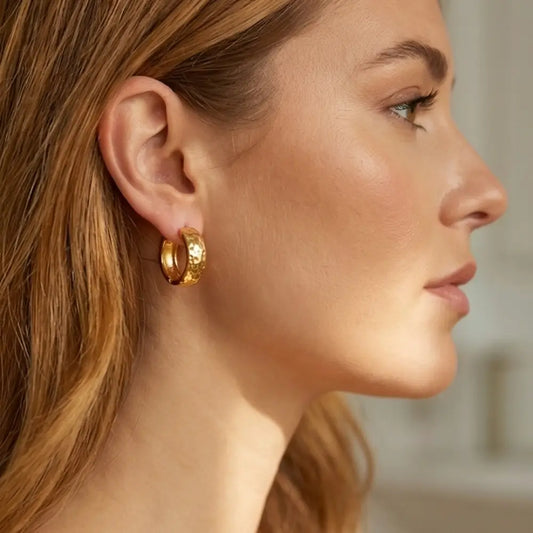 hammered gold hoop earrings on woman elegant everyday jewelry style