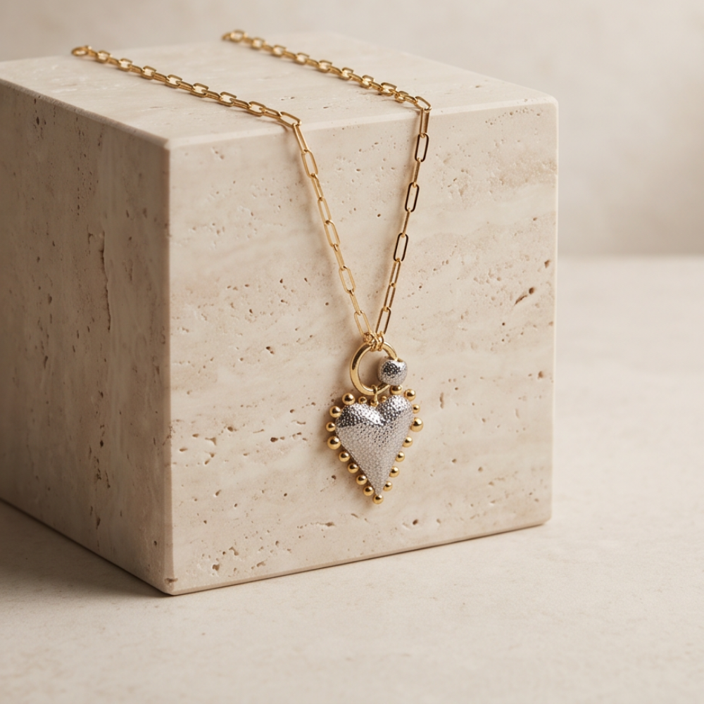 Full view of Luna gold paperclip chain necklace with two-tone heart pendant