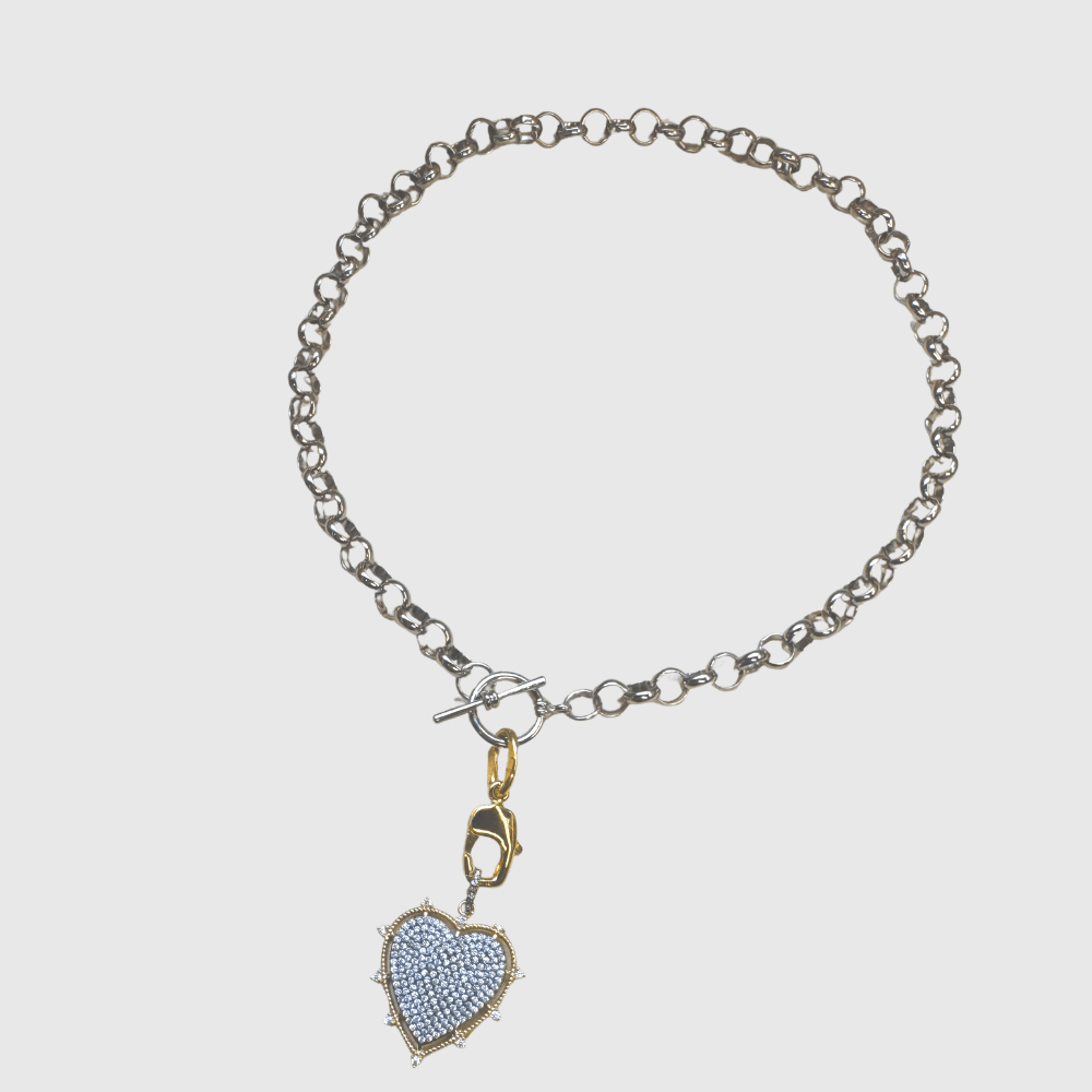 Mixed-metal toggle necklace with light blue pavé heart charm on silver chain