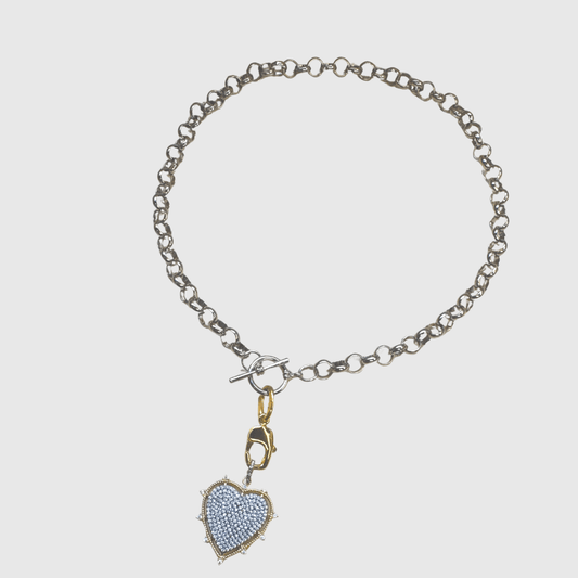 Mixed-metal toggle necklace with light blue pavé heart charm on silver chain