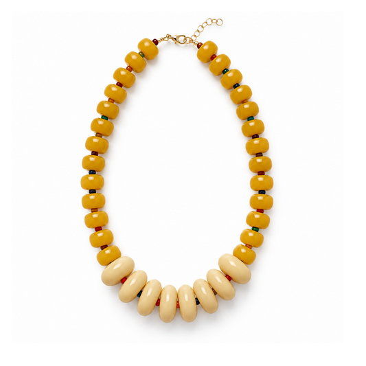 Ochre and ivory asymmetric acrylic donut bead statement necklace with multicolor seed bead accents from the Modern Relics Collection.
