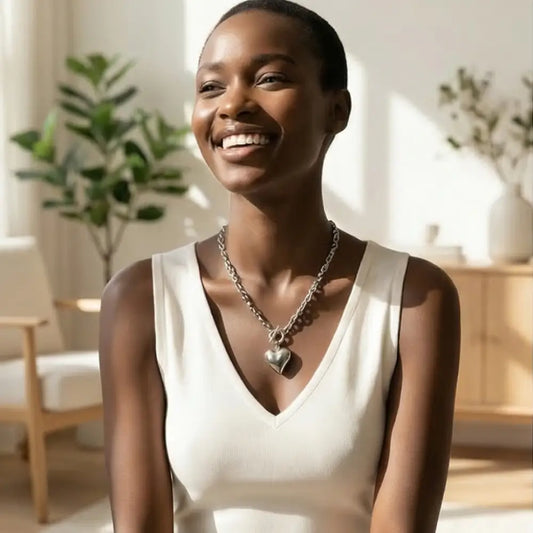 silver heart pendant chunky chain necklace worn by woman modern jewelry Julie Saldivia