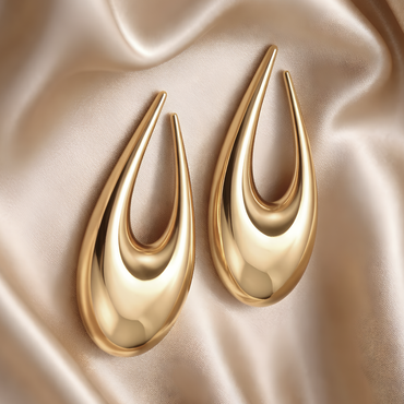 bold gold sculptural drop earrings elegant minimalist statement earrings