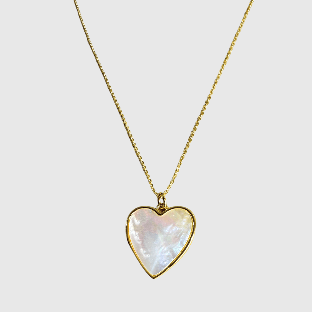 18K gold-plated necklace with mother-of-pearl heart pendant on a delicate chain.