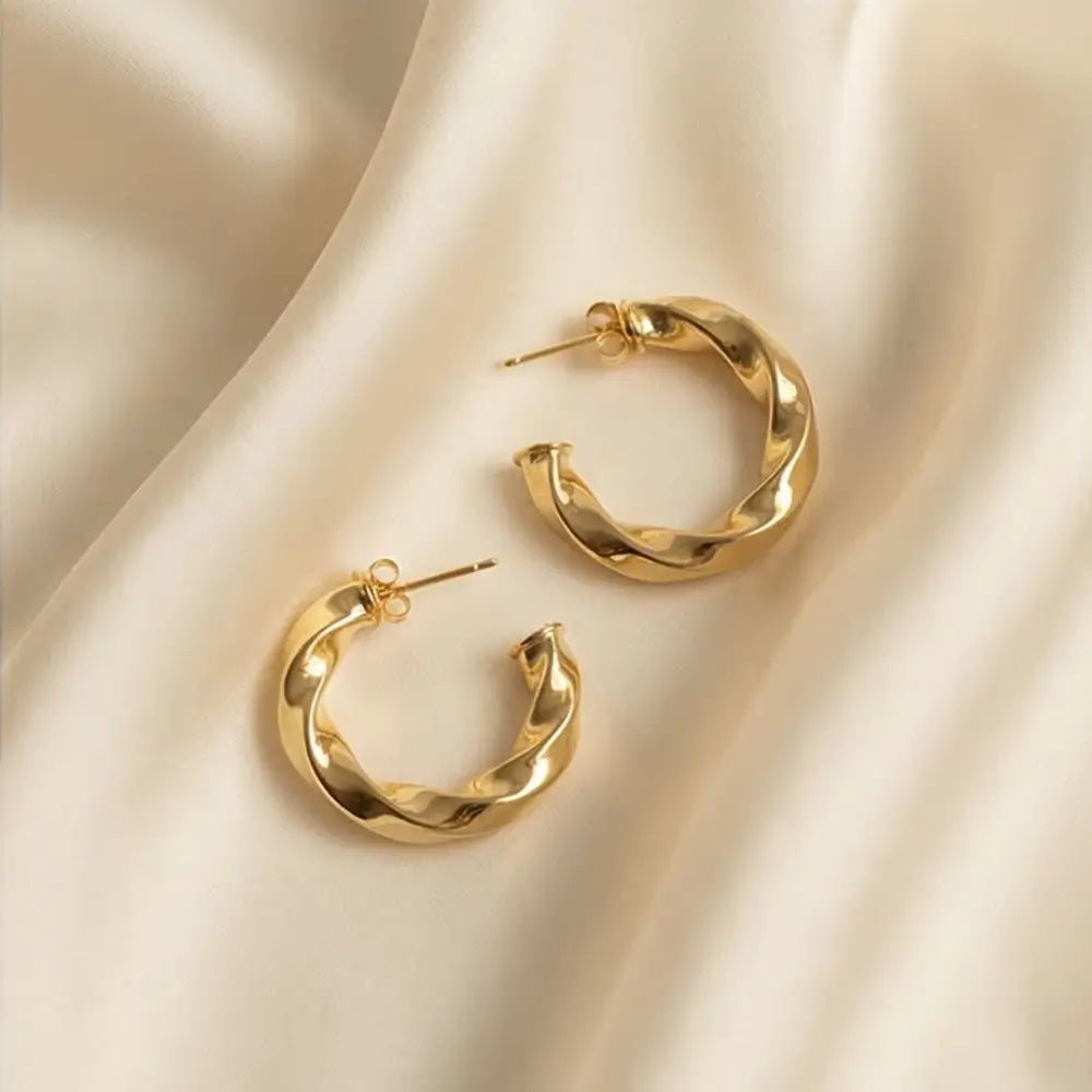 18k gold plated twisted hoop earrings on fabric modern bold lightweight gold jewelry for women