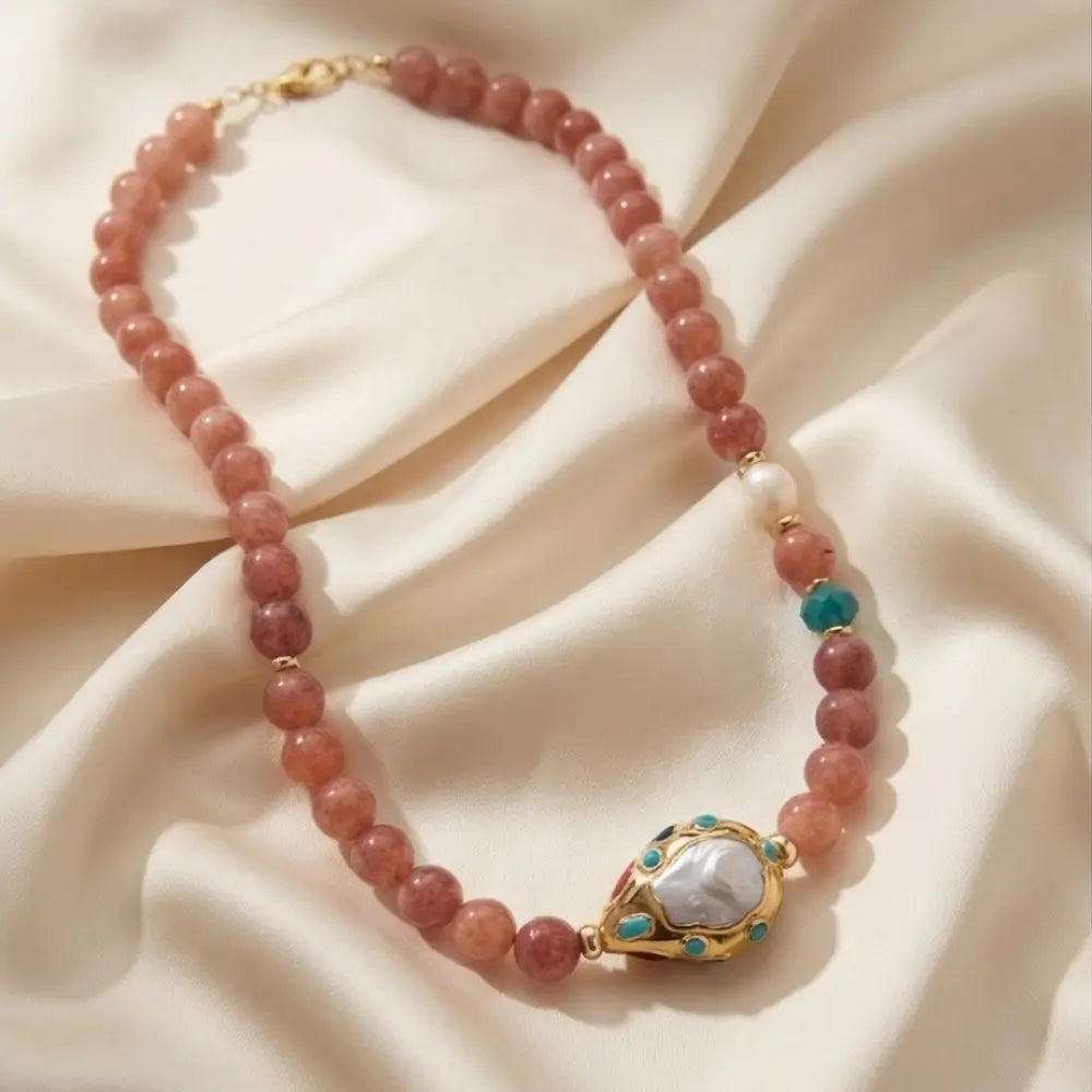 Angelite beaded statement necklace with dusty rose angelite stones, baroque pearl pendant and turquoise accents in gold setting