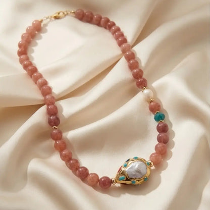 Angelite beaded statement necklace with dusty rose angelite stones, baroque pearl pendant and turquoise accents in gold setting