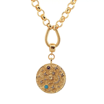 Gold necklace with a detailed pendant on a white background