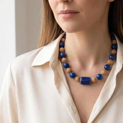 Woman wearing handcrafted Cobalt Blue Candy Bead Statement Necklace by Julie Saldivia