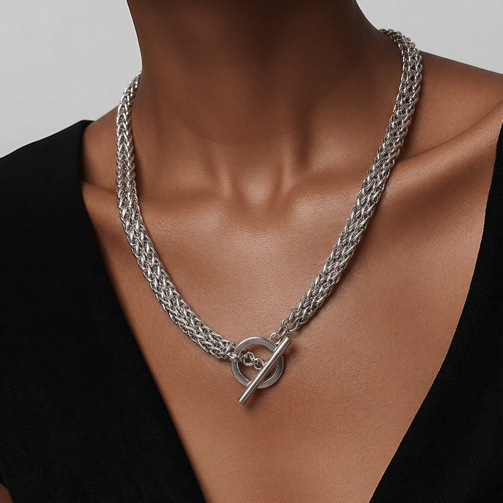 Modern silver toggle necklace styled as dramatic drop necklace