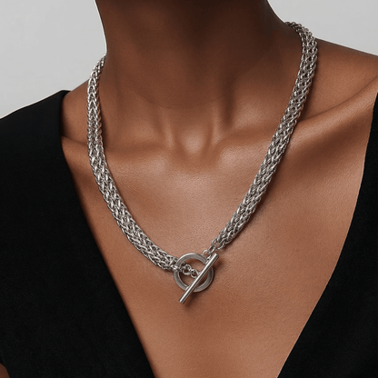 Modern silver toggle necklace styled as dramatic drop necklace