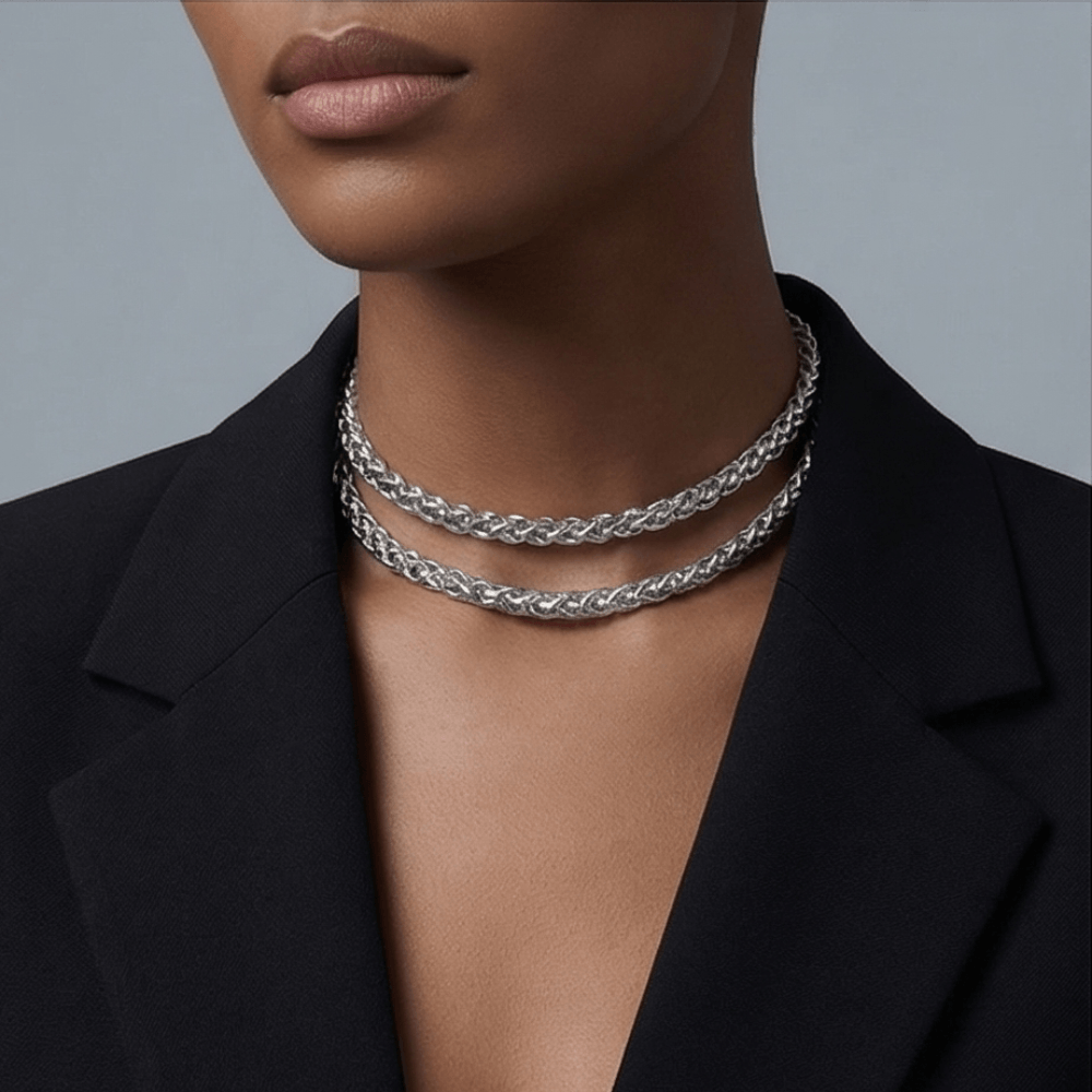 Convertible silver chain necklace with toggle clasp worn as statement necklace