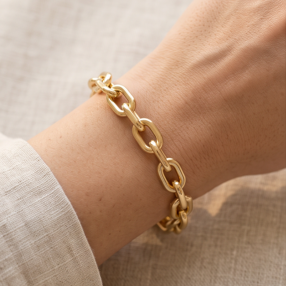 Élan Link 18K gold plated oval link bracelet worn on wrist