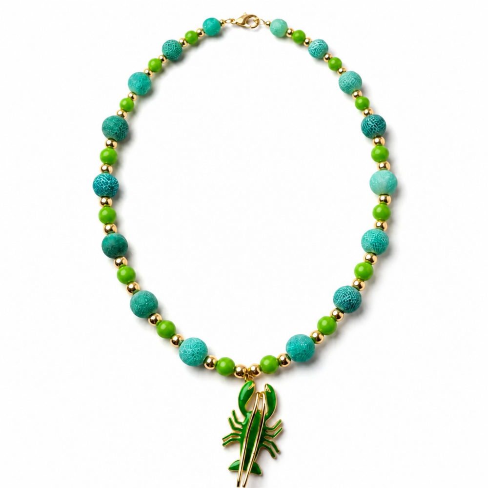Emerald Lobster necklace with 12 mm natural green fire-cracked agate beads, bright green accents, gold-tone spacers and green lobster pendant