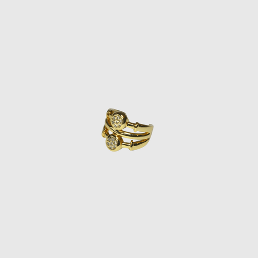 Minimalist gold ear cuff featuring two round pavé crystal ends
