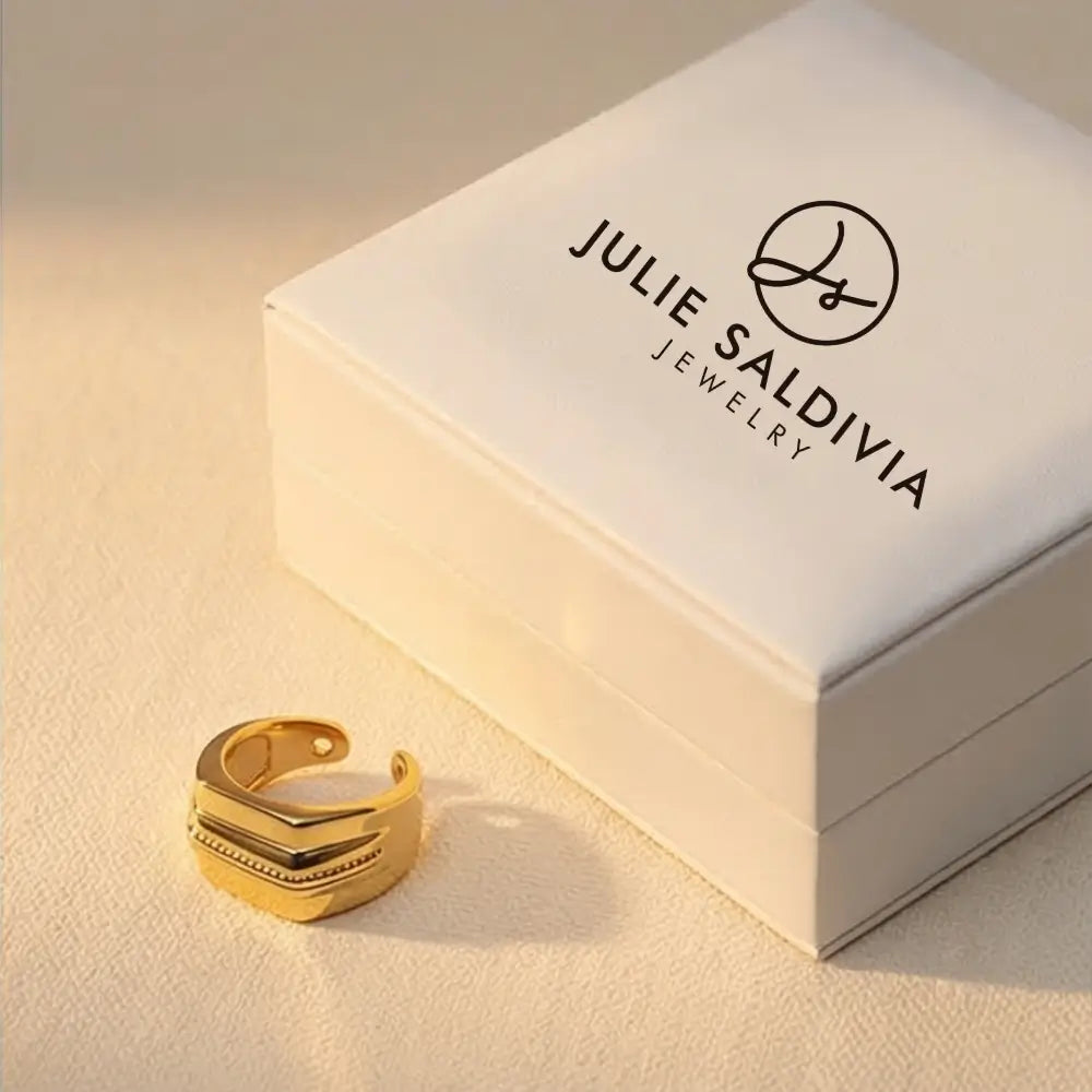 gold ear cuff with Julie Saldivia jewelry box luxury minimalist ear cuff packaging