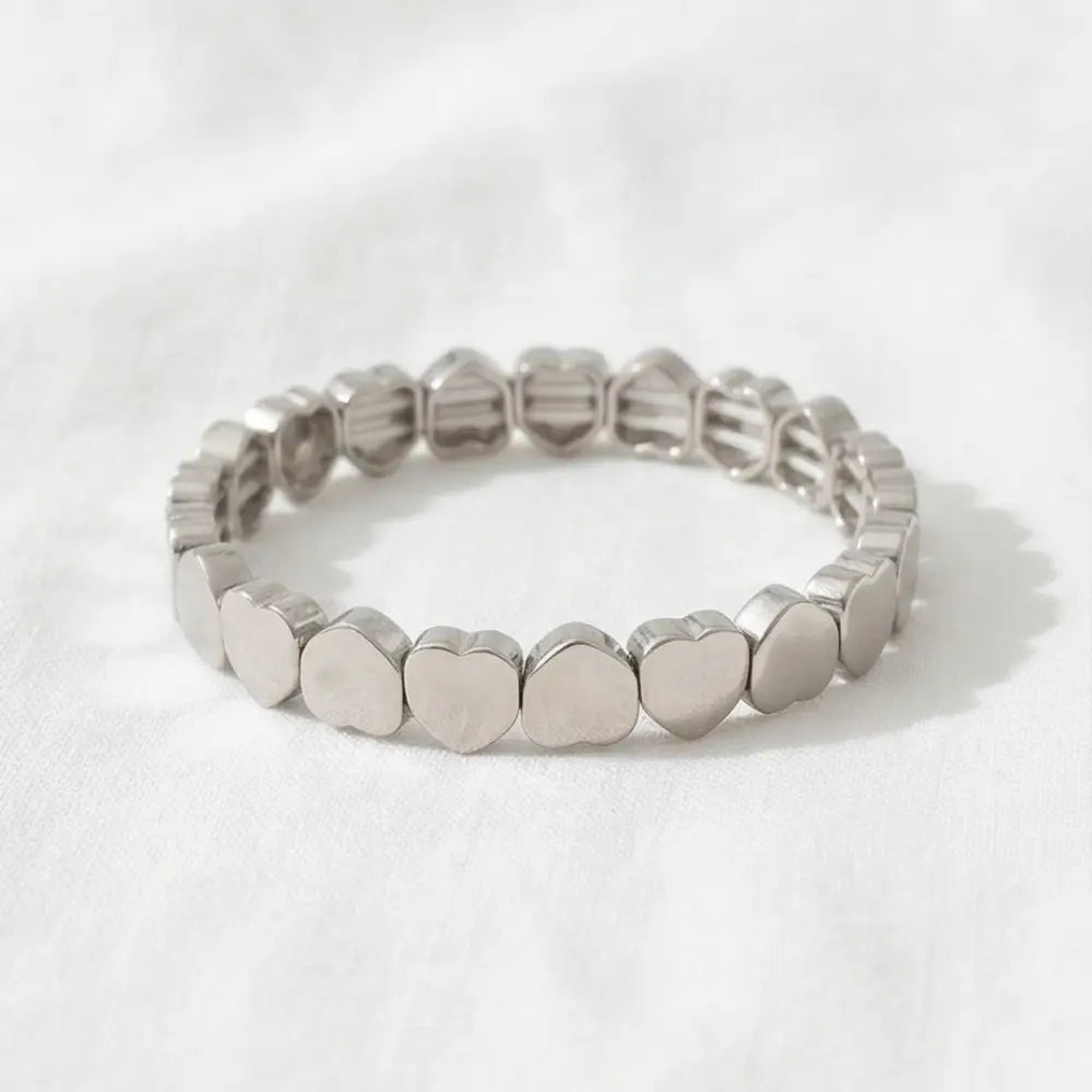 Gold or silver heart stretch bracelet for women, elastic beaded bracelet with minimalist heart charms.