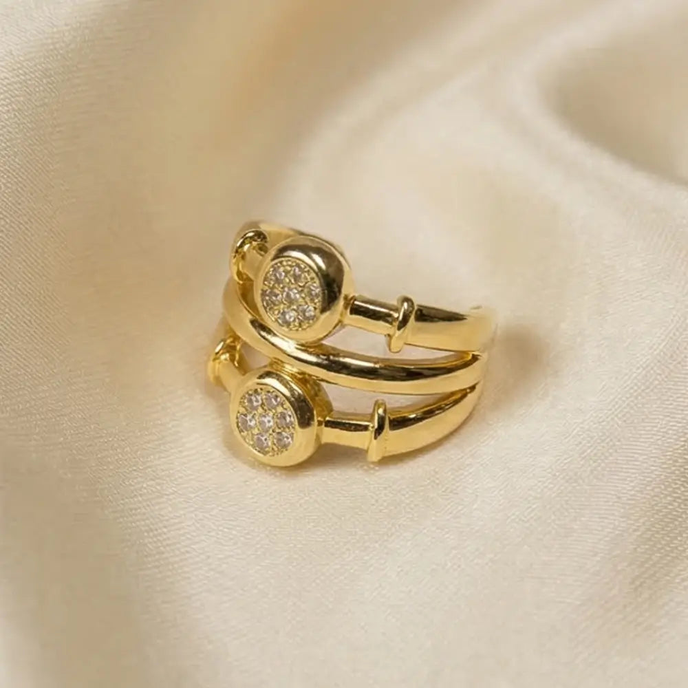 close up gold pavé ear cuff with micro crystals modern luxury ear jewelry Julie Saldivia