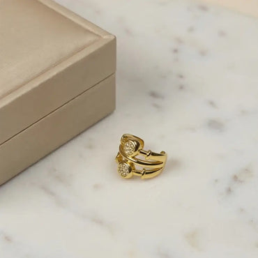 gold double pavé ear cuff on marble luxury jewelry product detail Julie Saldivia