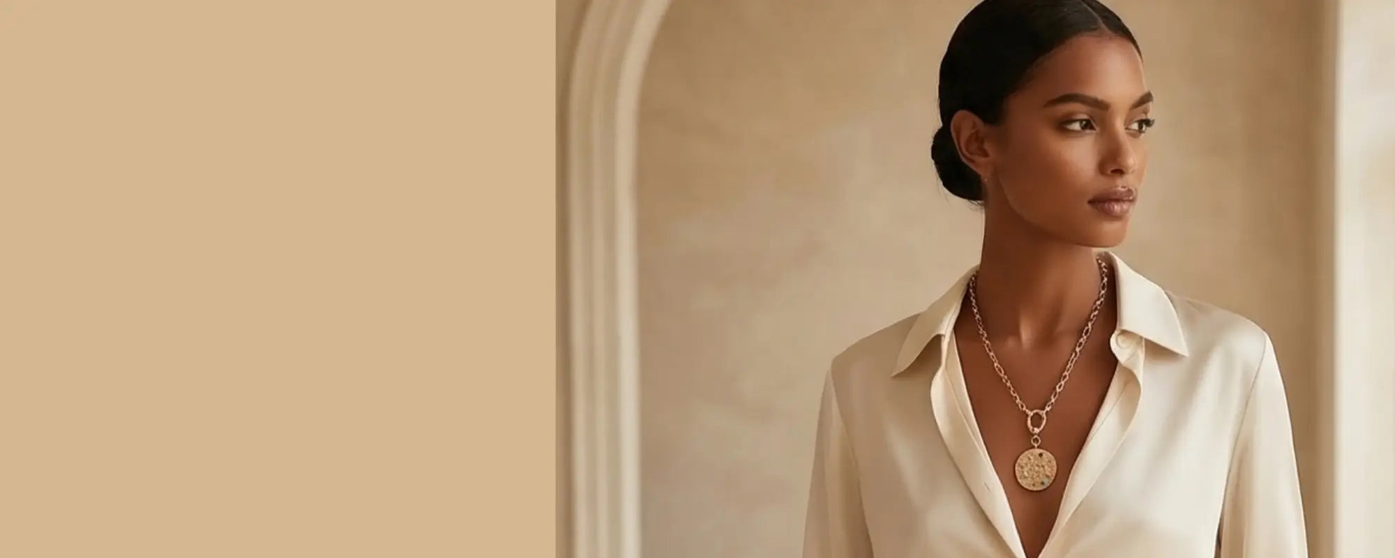 woman wearing gold statement necklace elegant modern jewelry by Julie Saldivia