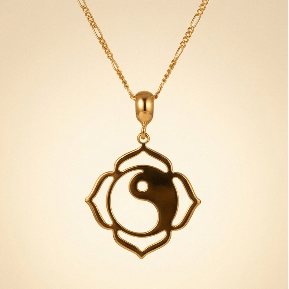gold yin yang lotus necklace flat lay with crystal and matcha minimalist jewelry aesthetic