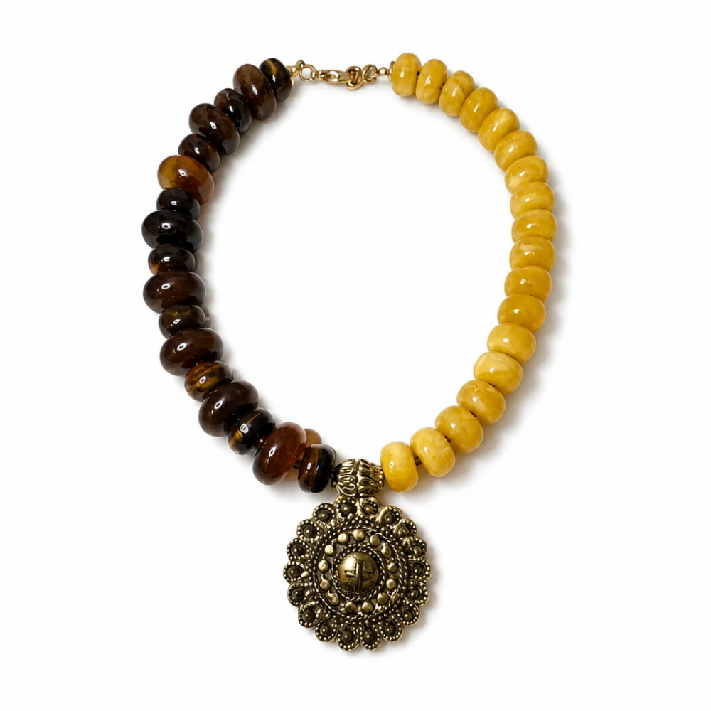 Golden Earth statement necklace with brown and mustard acrylic beads and antique gold-tone medallion pendant