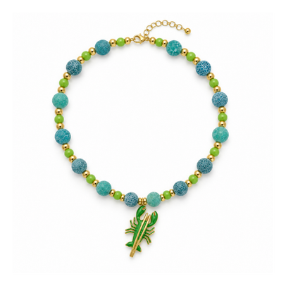 18-inch natural fire-cracked agate necklace with green accent beads, gold-tone spacers and a green lobster charm.