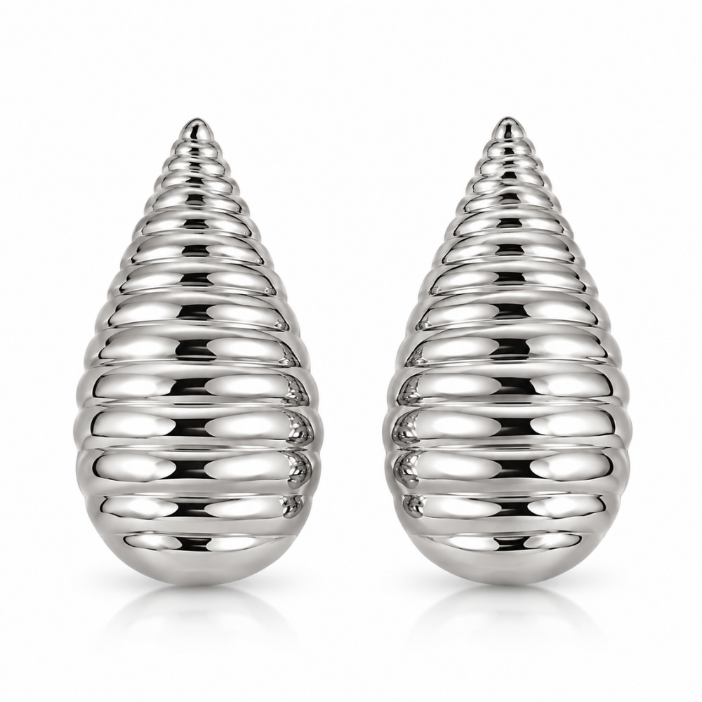 Pair of polished silver-tone cocoon earrings with elongated teardrop silhouettes and rounded horizontal ridges on a white background.