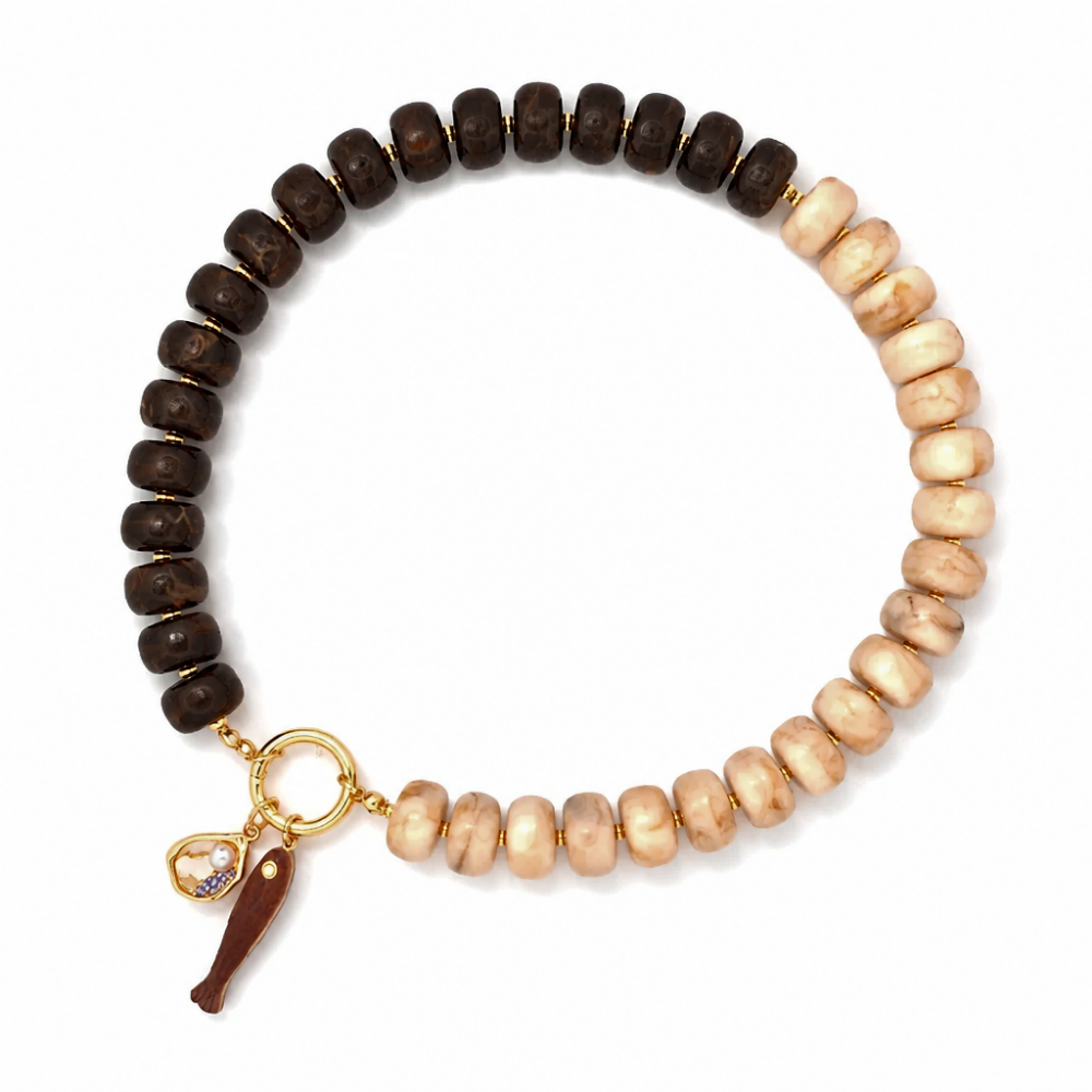 A beaded stretch bracelet featuring dark brown wooden beads on one side and light beige stone beads on the other, finished with a gold-tone clasp and a small charm.