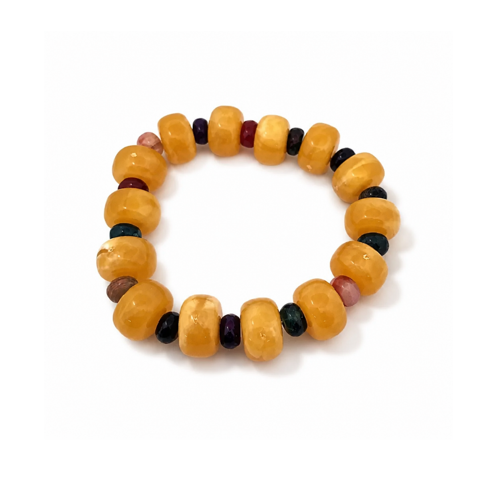 Mila stretch bracelet with amber acrylic beads and natural amethyst accents from Julie Saldivia Modern Relics