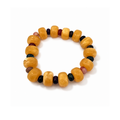 Mila stretch bracelet with amber acrylic beads and natural amethyst accents from Julie Saldivia Modern Relics