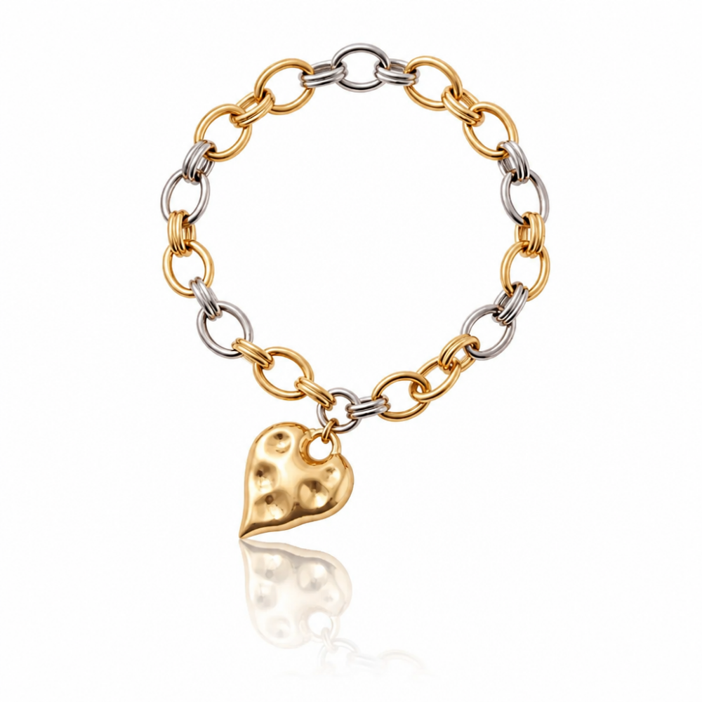 Two-tone 18K gold-plated bracelet with textured heart charm from the Modern Relics Collection by Julie Saldivia