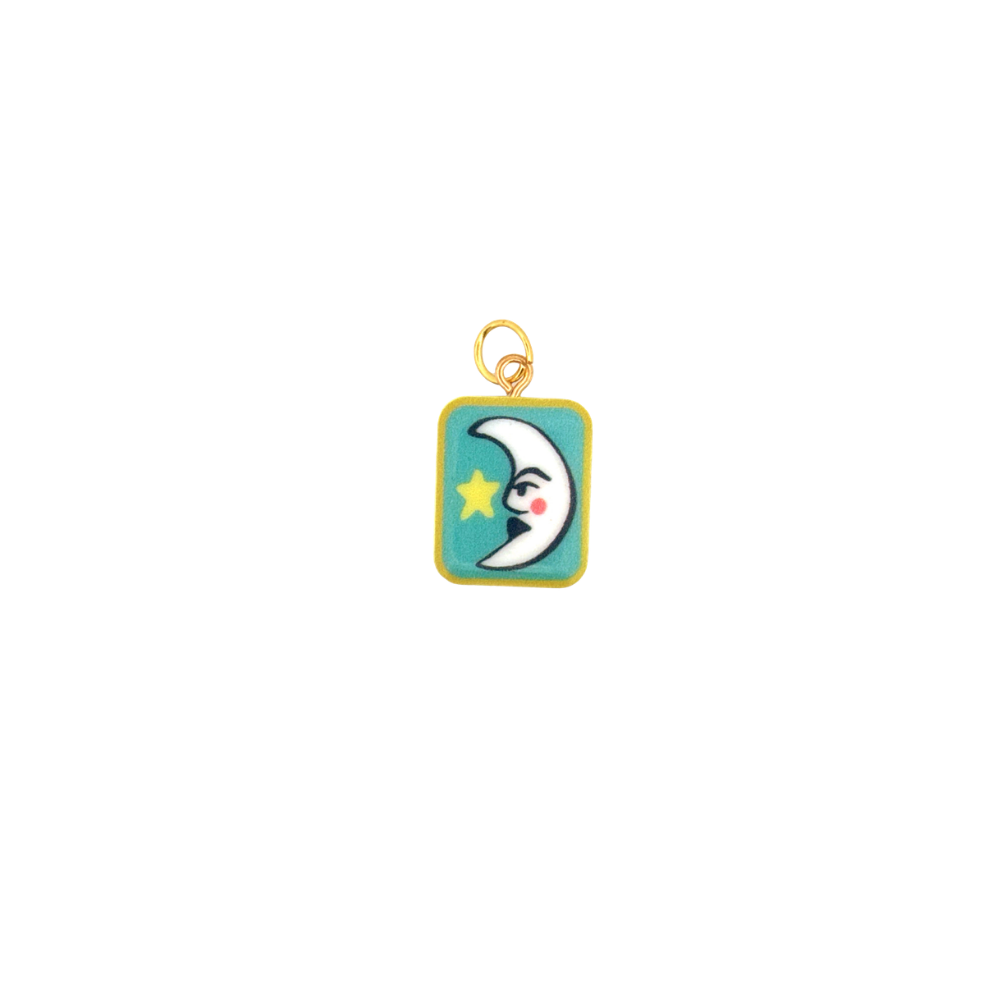 Blue enamel charm featuring crescent moon and yellow star.