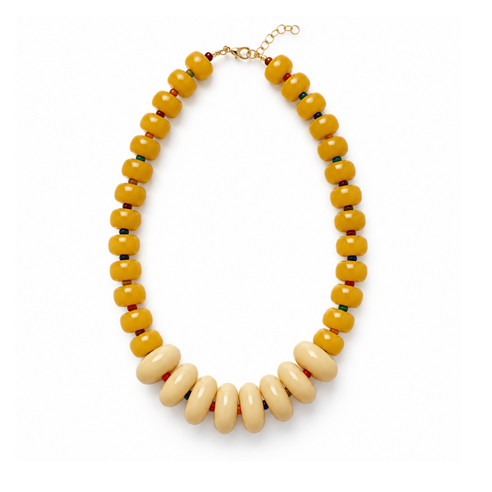Ochre and ivory asymmetric acrylic donut bead statement necklace with multicolor seed bead accents from the Modern Relics Collection.