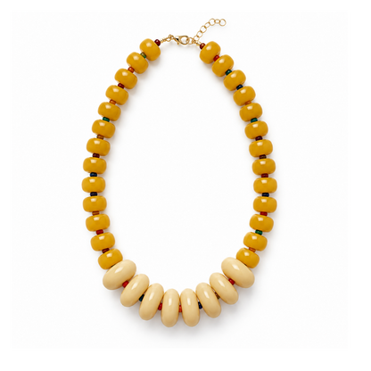Ochre and ivory asymmetric acrylic donut bead statement necklace with multicolor seed bead accents from the Modern Relics Collection.