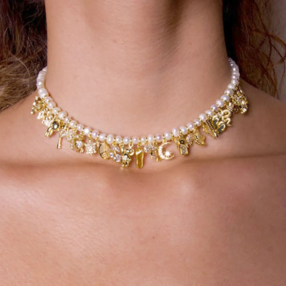 Freshwater pearl choker necklace with gold charms, trendy statement necklace for women Julie Saldivia