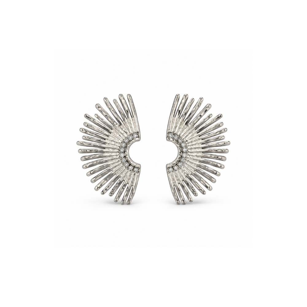 Pair of silver-tone sculptural statement earrings with radiating textured rays and clear accents along the curved center.