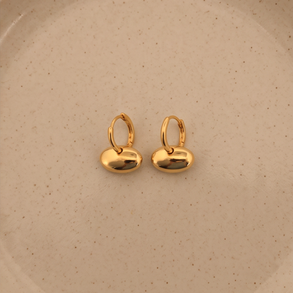 Gold sculpted pebble drop earrings in plated stainless steel