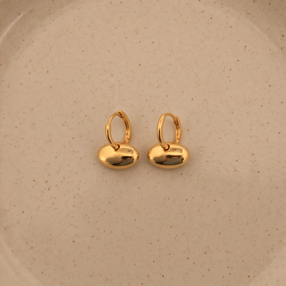 Gold sculpted pebble drop earrings in plated stainless steel