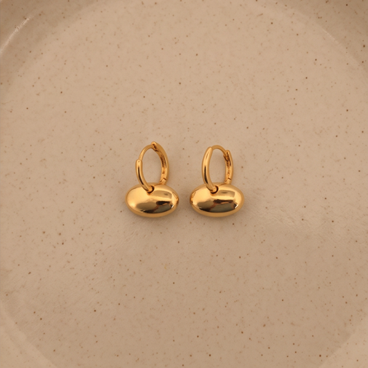 Gold sculpted pebble drop earrings in plated stainless steel
