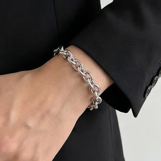 woman wearing silver chunky chain bracelet modern minimal jewelry Julie Saldivia