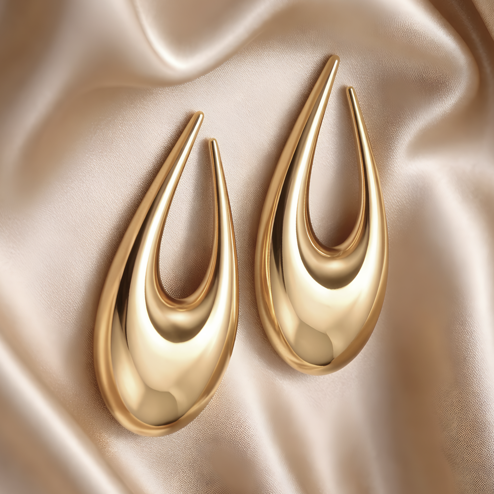 bold gold sculptural drop earrings elegant minimalist statement earrings