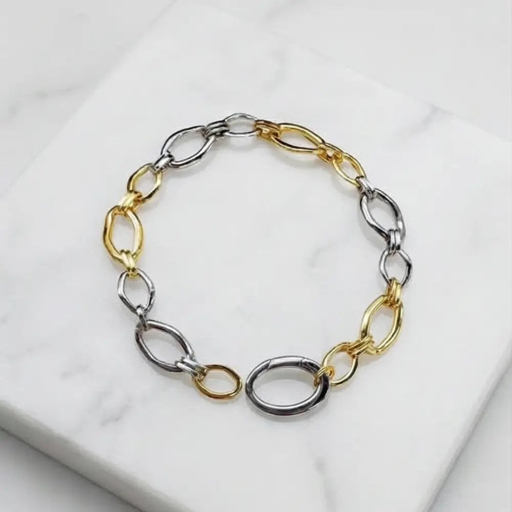 two tone gold and silver chain bracelet minimal modern jewelry Julie Saldivia