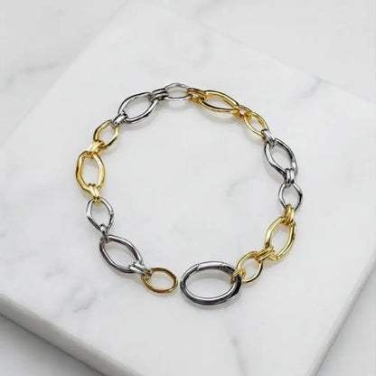 two tone gold and silver chain bracelet minimal modern jewelry Julie Saldivia
